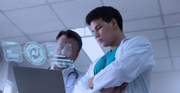 Two doctors looking at a laptop and an hologram that says 'AI'.