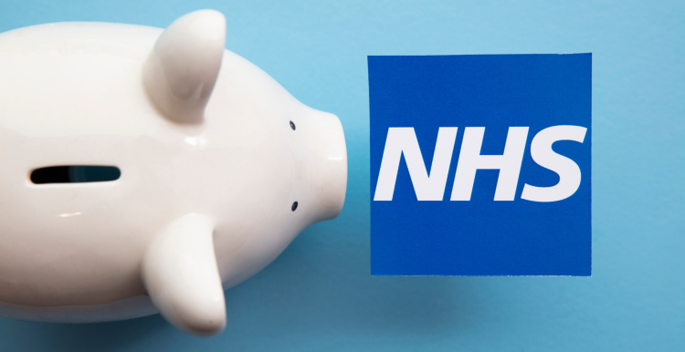NHS logo on a blue background next to a piggy bank.