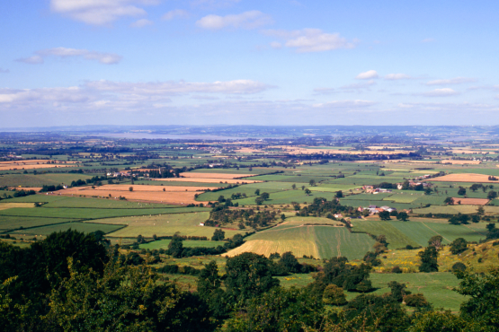 Patchwork fields and small villages in Gloucestershire.